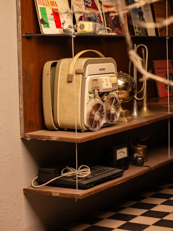 radios-and-phones-on-shelf-retro